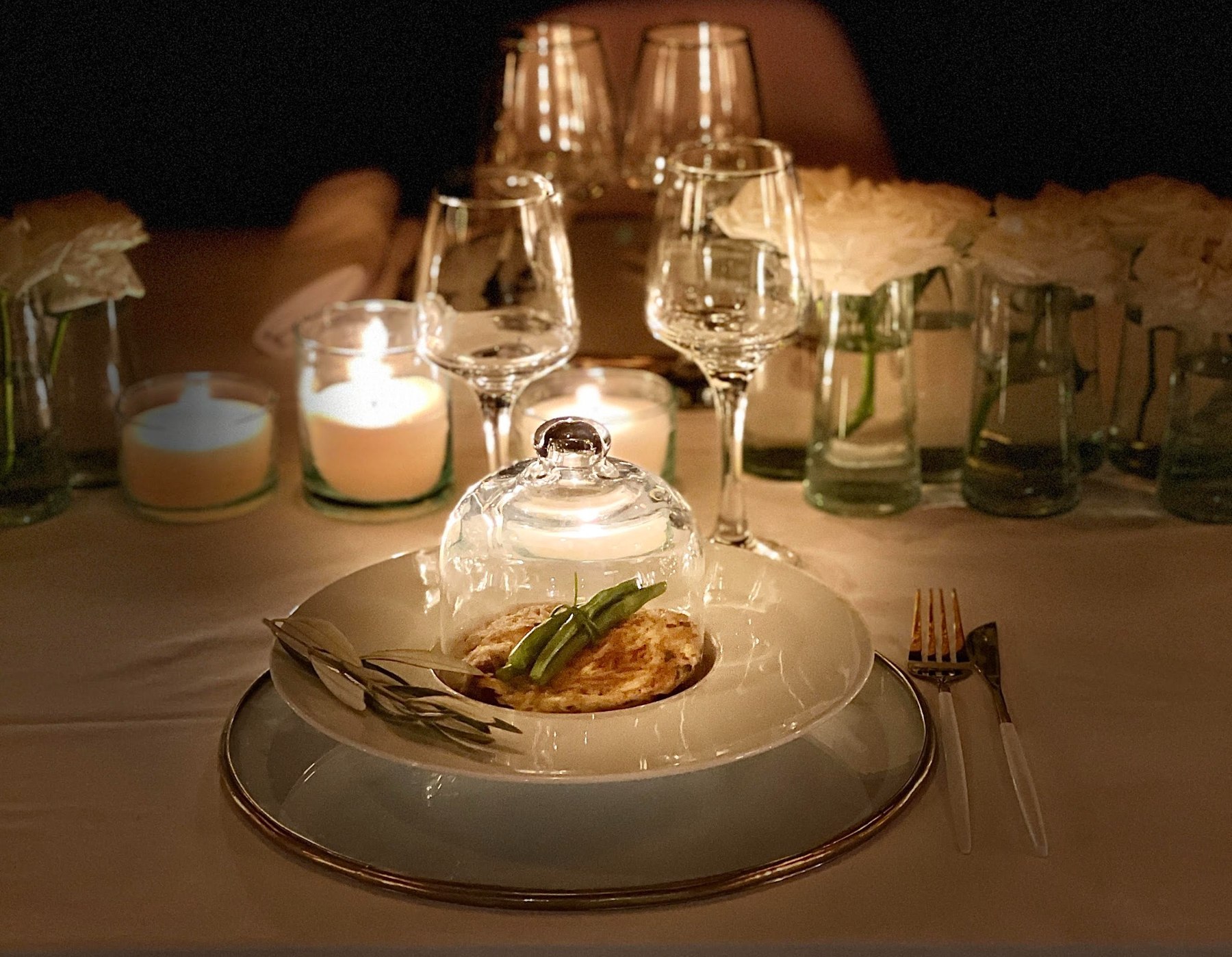 Plated dinner under candlelight