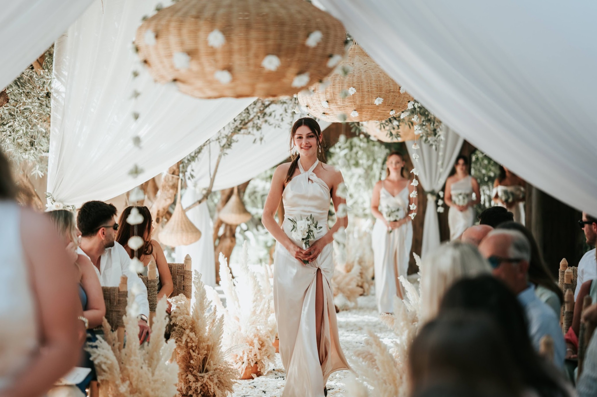 Bridesmaids entering during a wedding ceremony in Marrakech